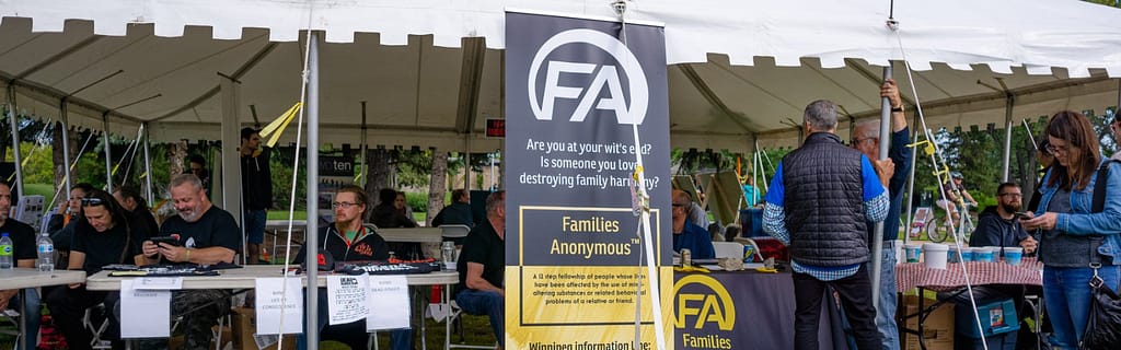 Families Anonymous tent with volunteers