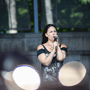Woman singing on stage