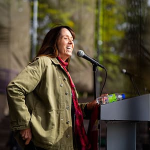 Woman speaking on stage